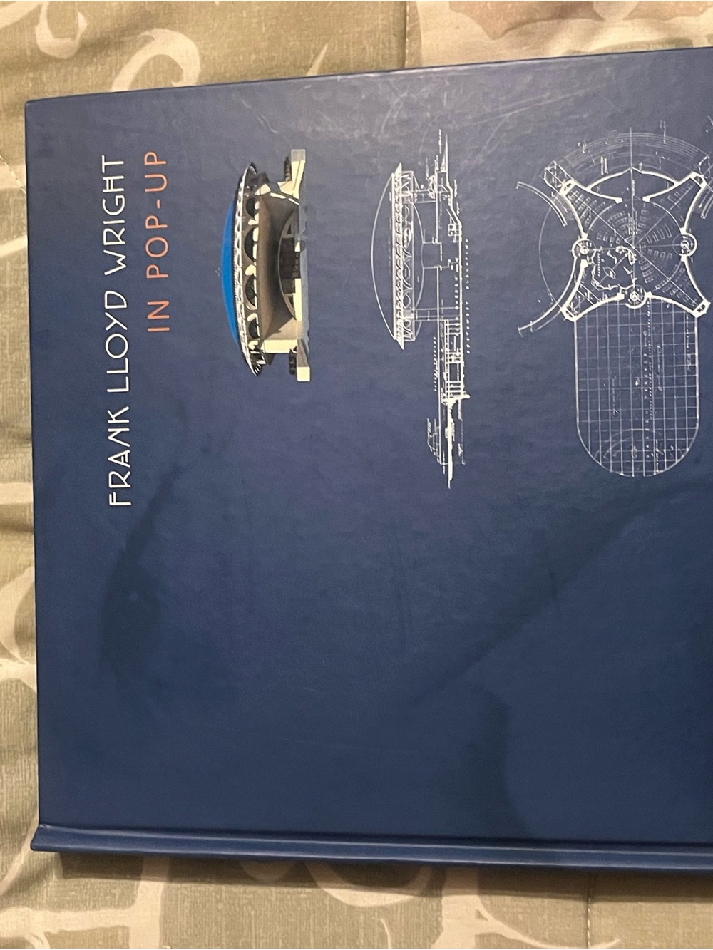 Frank Lloyd Wright Hardcover Book — Blue Cover with White and Orange Accents
